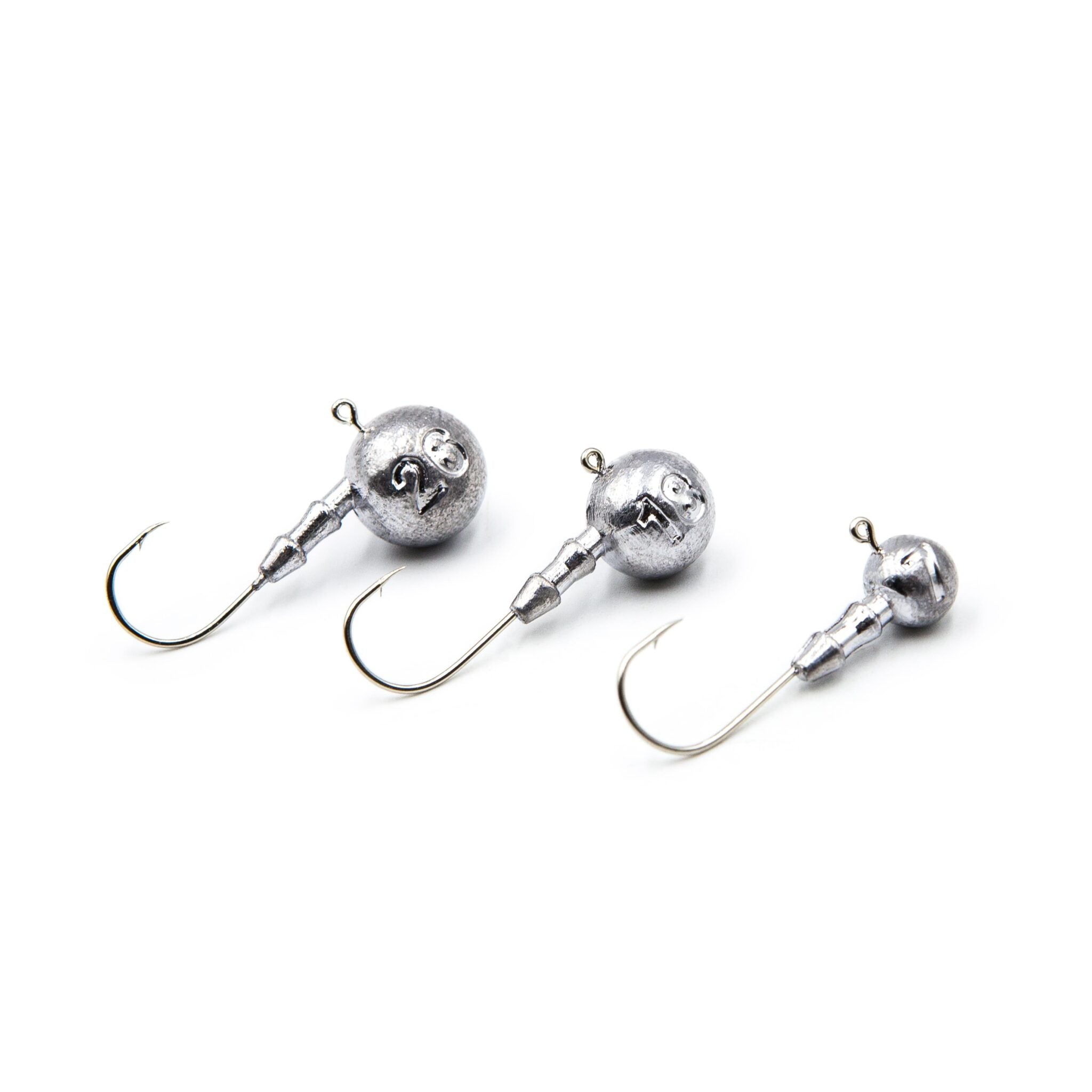 Three unpainted classic round ball jig heads with Gamakatsu 2/0 hooks.
