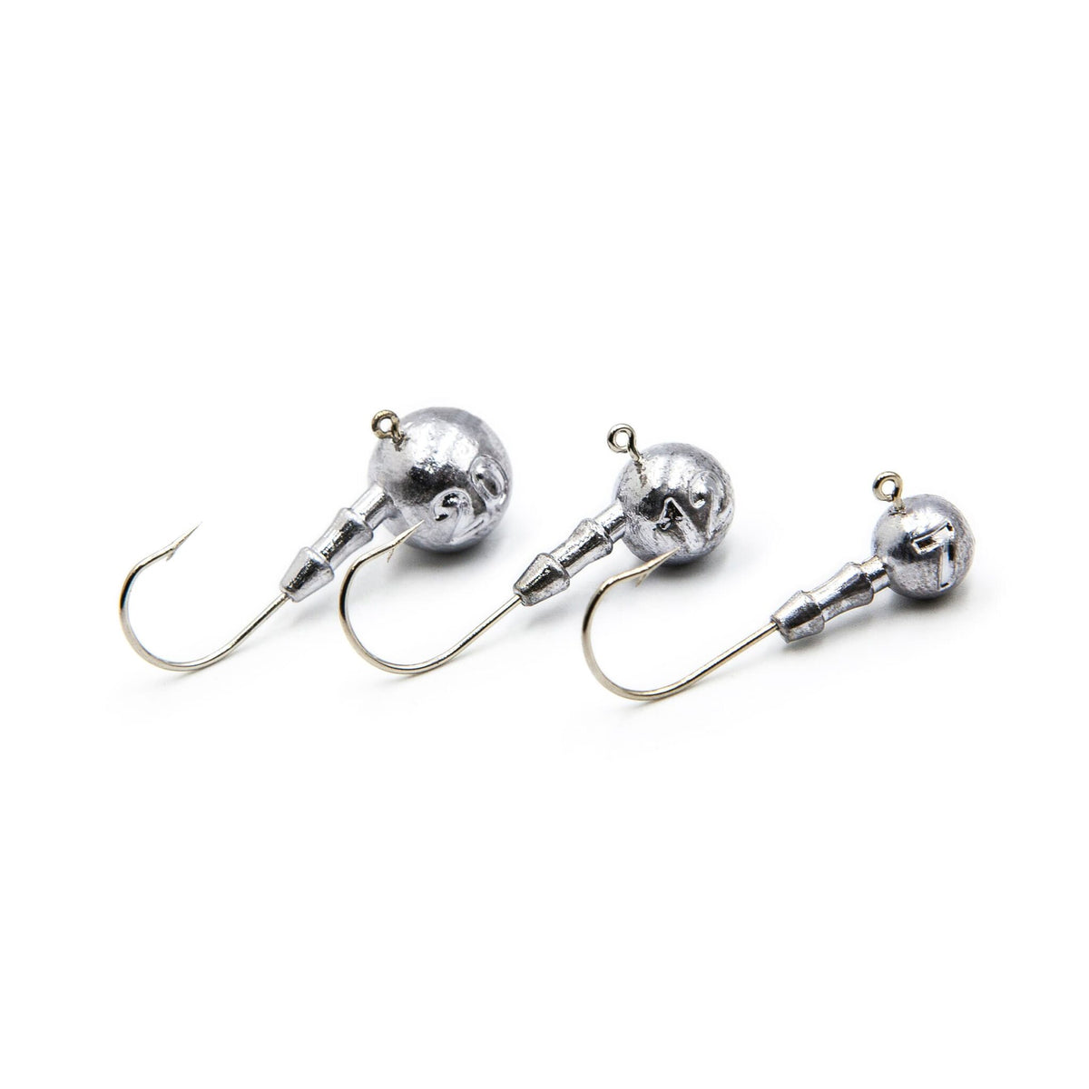 Three unpainted FishTrailCo Classic Jig Heads
