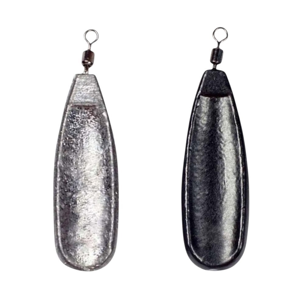 Two FishTrailCo Slow Glide Jig Rig weights, one black and one unpainted, with elongated bodies and swivel attachments.