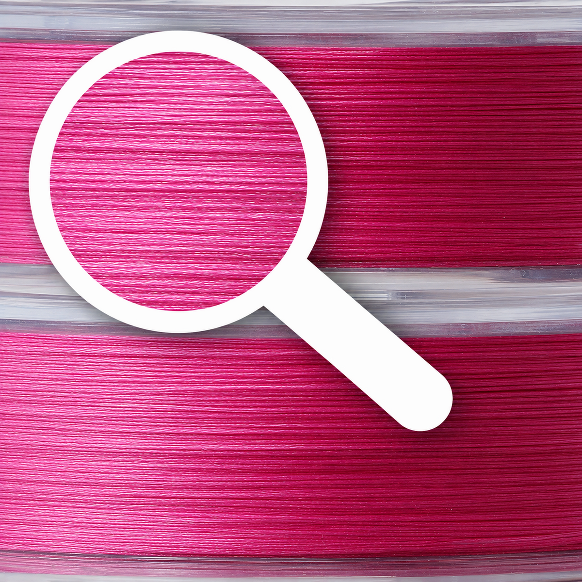 Close-up of Intech MicroN PE X8 pink braided line wound on a spool, with a magnifying glass graphic highlighting the braid texture.